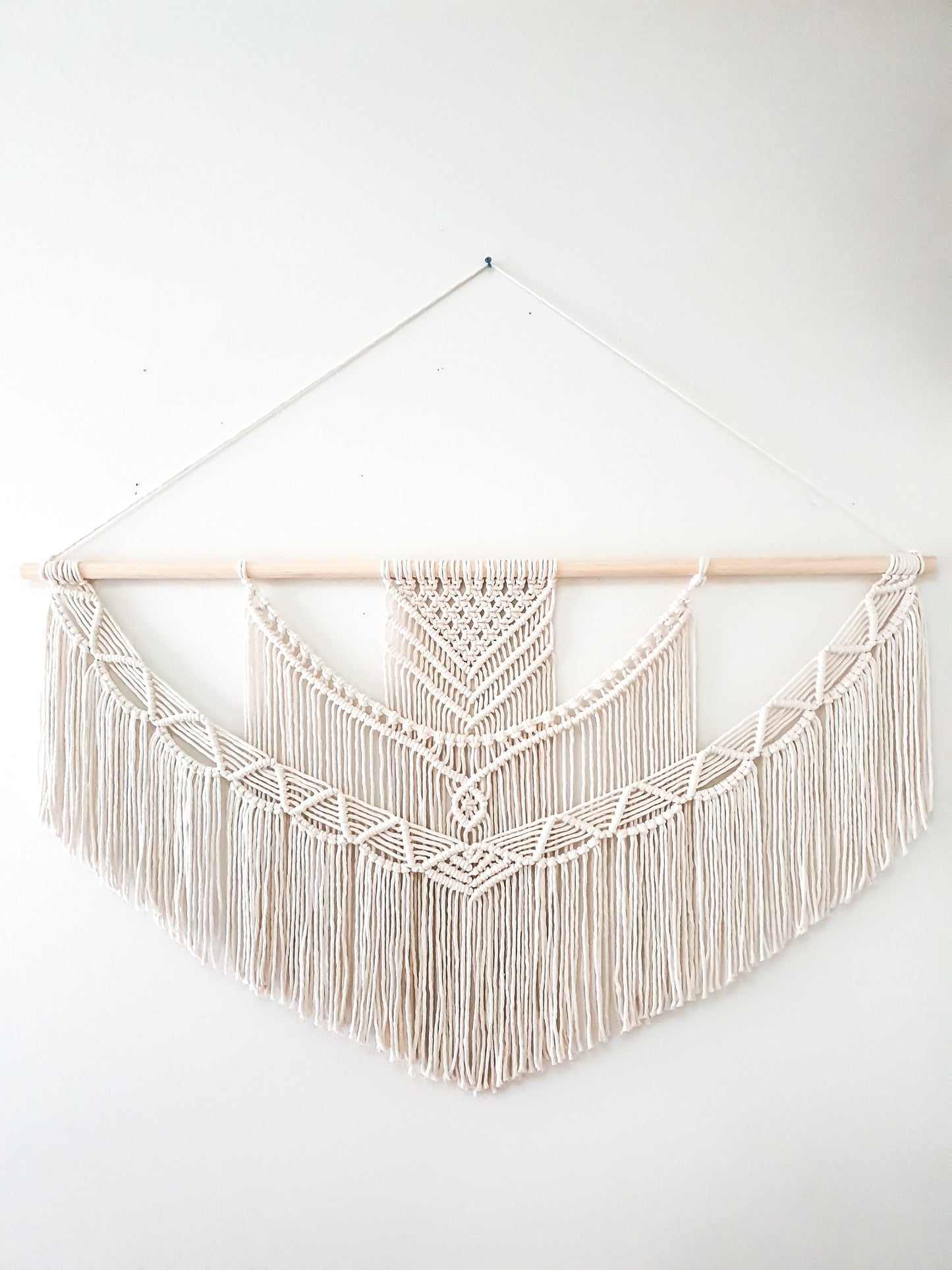 Beige (off white) extra large macrame wall hanging on a thick wooden dowel. This is a 4 foot wide size, other sizes available in dropdown menu.