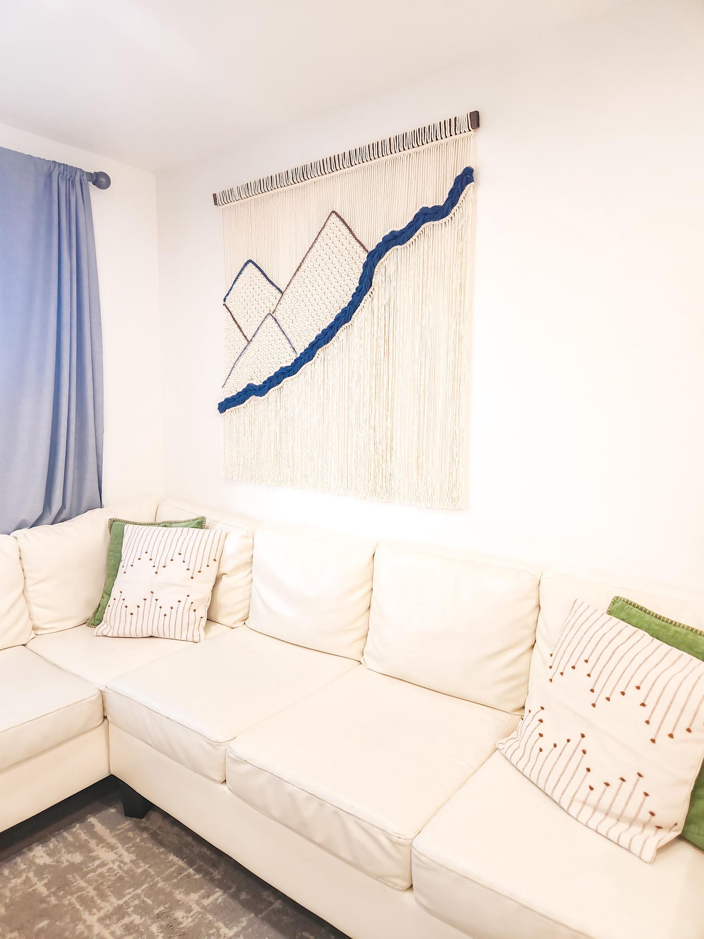 Natural white extra large macrame wall hanging with woven blue river and blue, brown dyed mountains